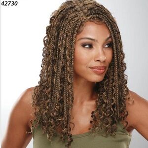 long wig with a stylish mix of curls and braids.